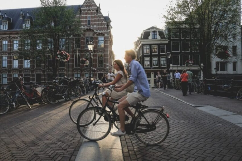 Couple Biking in a Street
