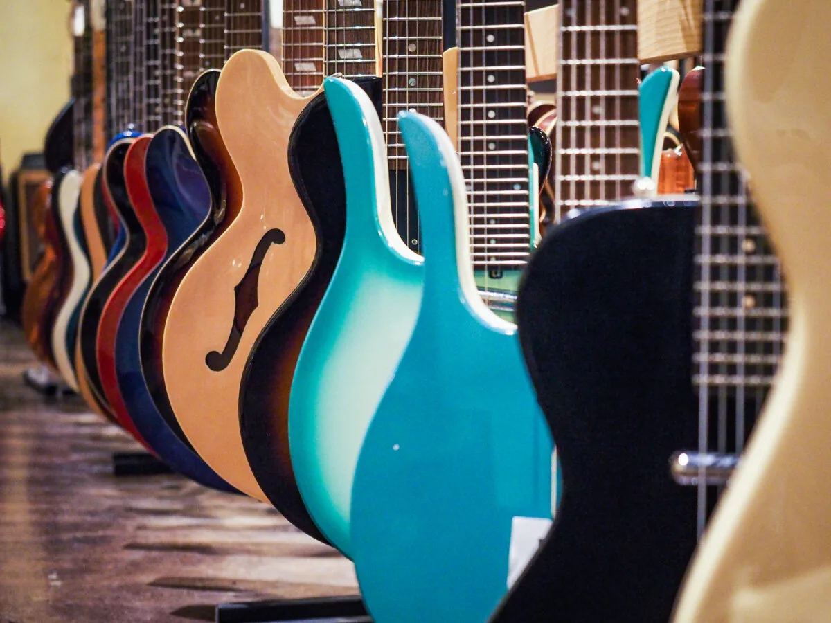 Row of electric and hollow body guitars at Carter Vintage Guitars, in Nashville, TN